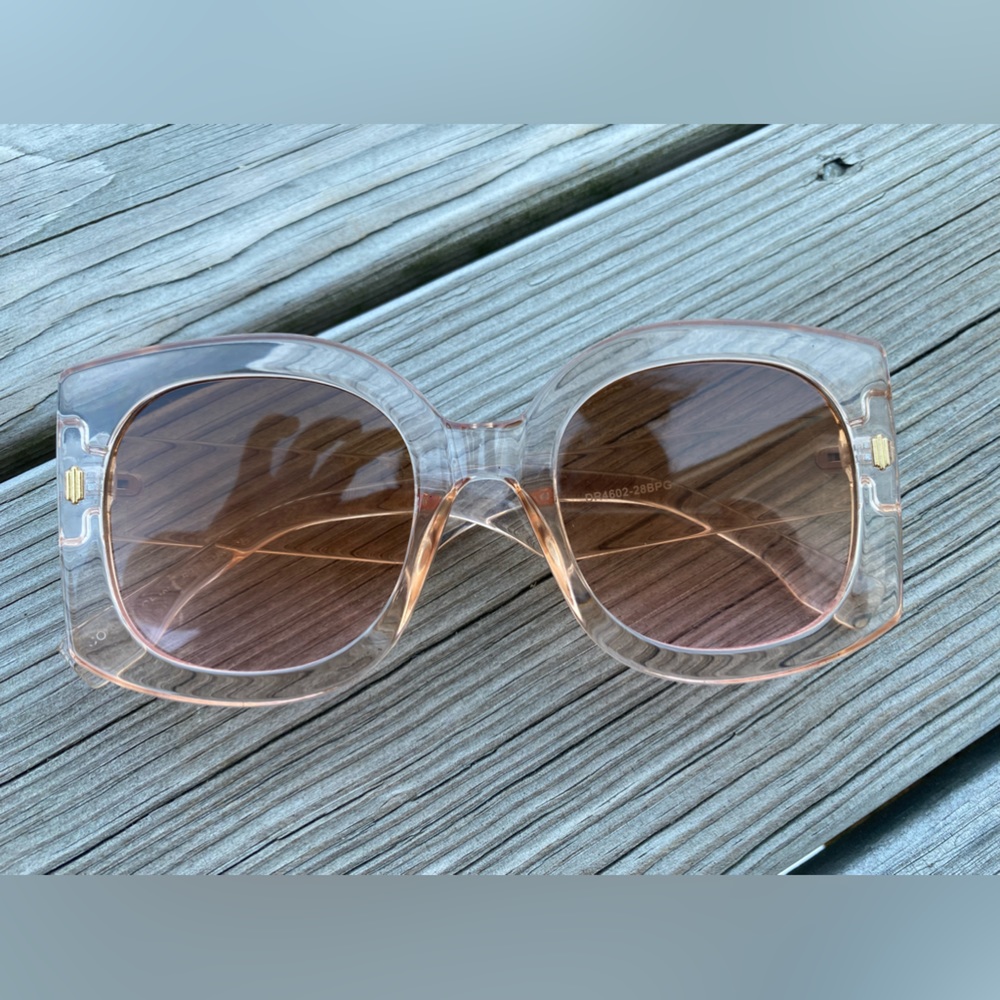 Fashion Nova pink/mauve sunglasses.